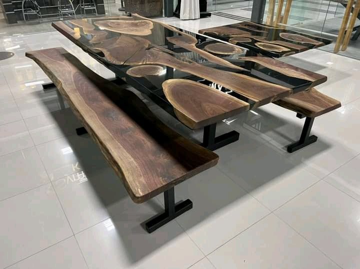 custom-black-epoxy-island-table-brushed-steel-legs Custom black epoxy island dining table brushed steel legs detail
