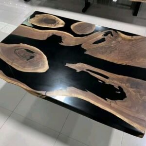 Black epoxy river coffee table matching live edge dining set