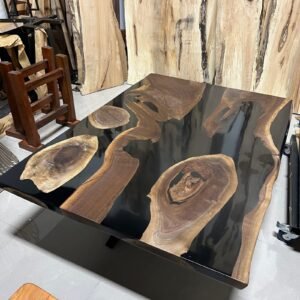 Black epoxy river coffee table matching live edge dining set top view