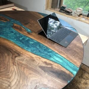 Black walnut teal epoxy dining table grain detail populated
