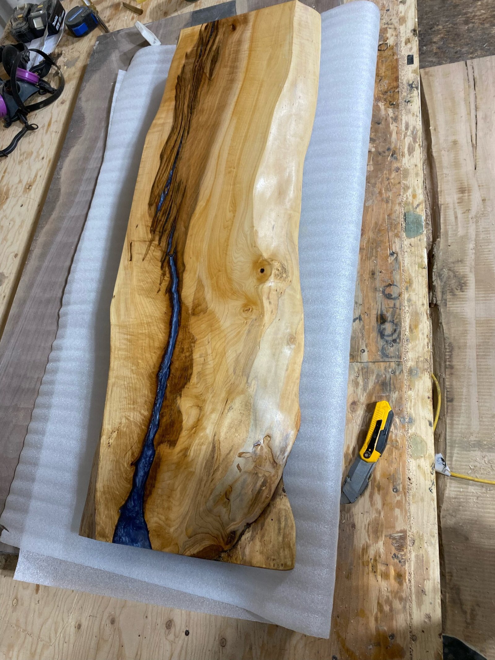 maple-live-edge-console-table-epoxy-highlights-angled-view Maple live edge console table calcite blue epoxy highlights angled view