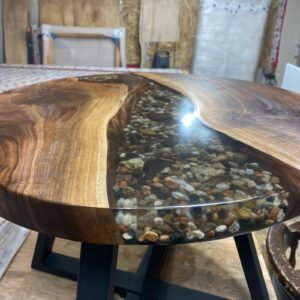 Round black walnut epoxy river coffee table natural rock feature top view