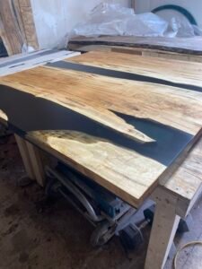 Ambrosia maple semi-clear black epoxy river coffee table top view