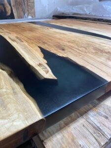 5ft ambrosia maple black epoxy river coffee table angled view